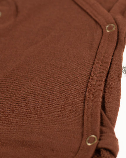 Kurzarm-Wickelspielanzug aus Wolle – Merinowolle