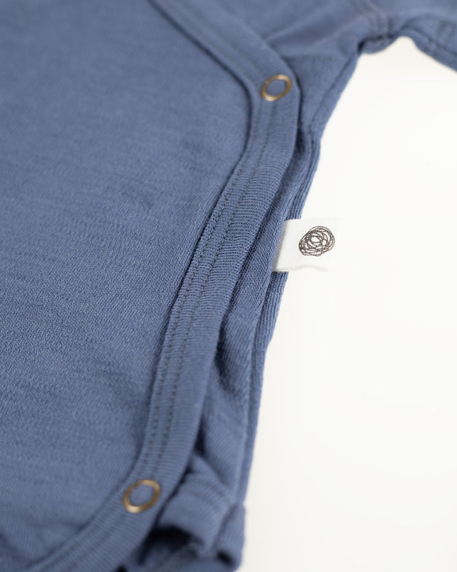 Kurzarm-Wickelspielanzug aus Wolle – Merinowolle