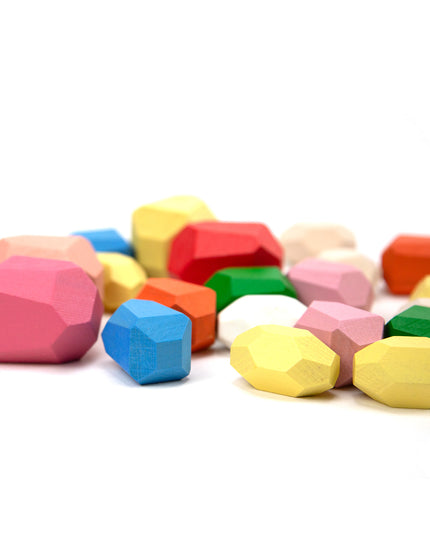 Holzspielzeug - Kieselsteine ​​- Farbige Stapelsteine ​​aus Holz - 20 Stück