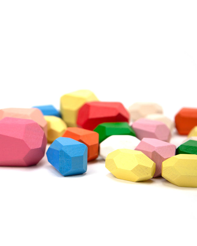 Holzspielzeug - Kieselsteine ​​- Farbige Stapelsteine ​​aus Holz - 20 Stück